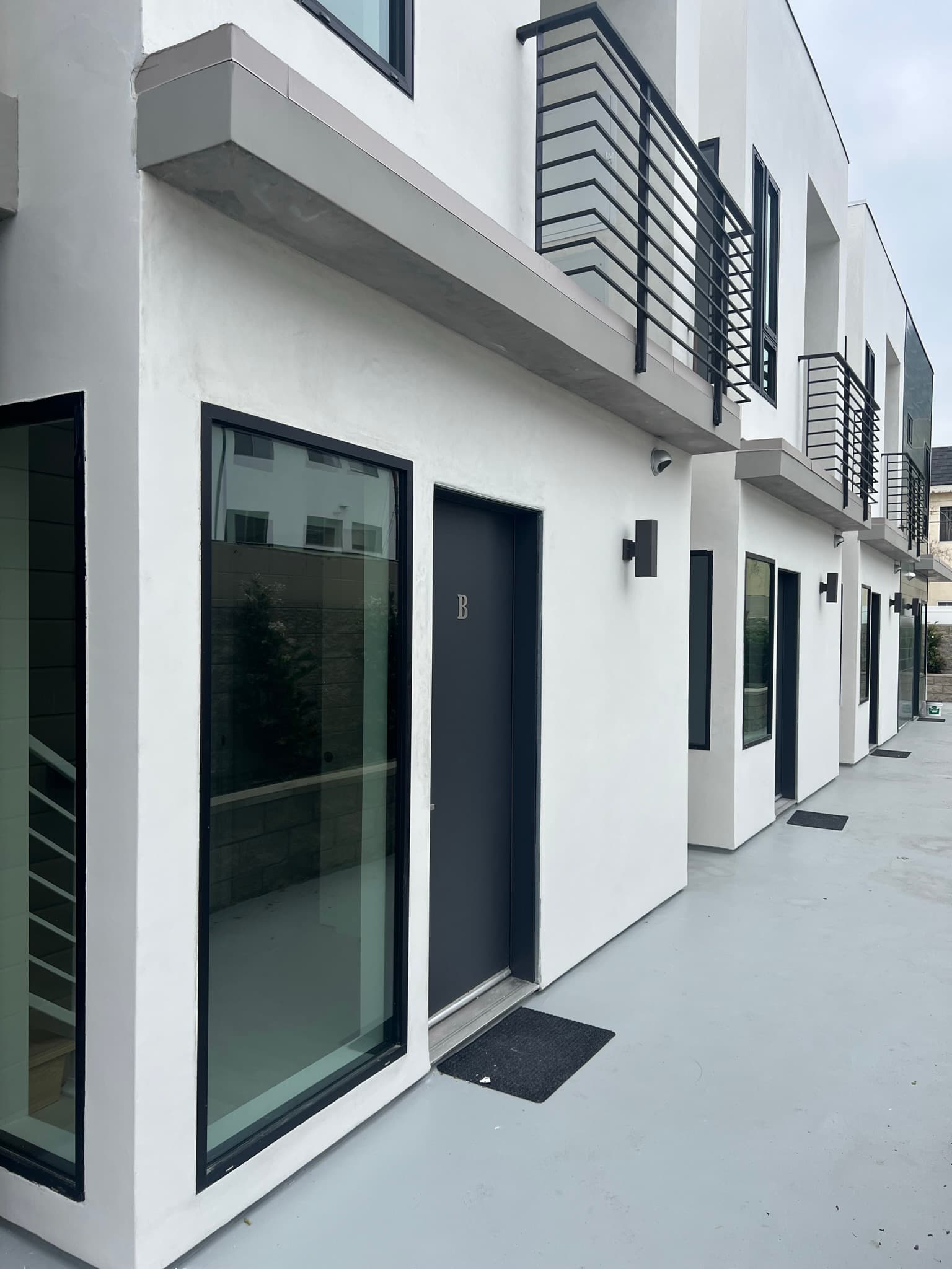 Doran Townhomes unit entrance along the shared courtyard