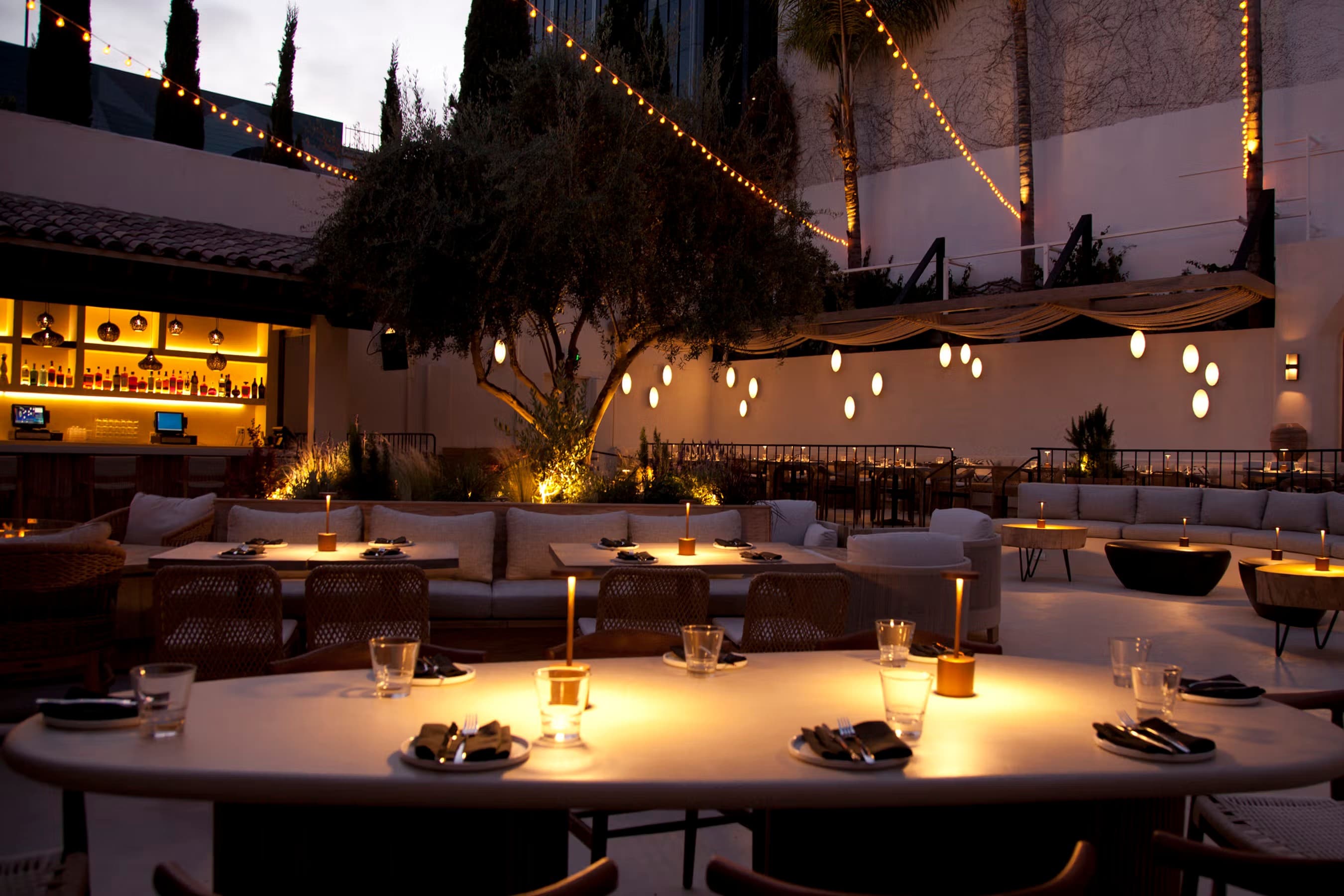 Laya Restaurant bar and lounge patio at night